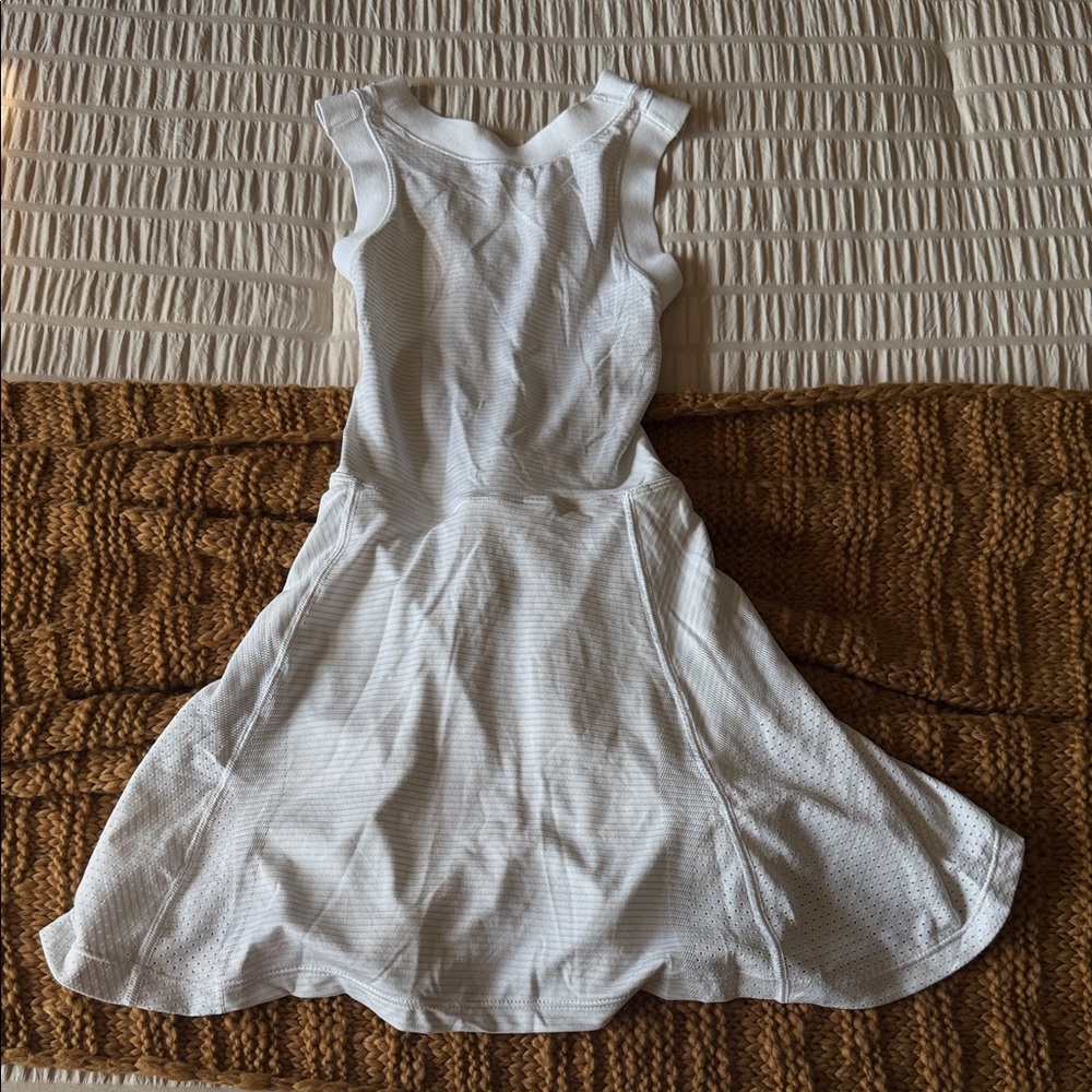 Swiftly tech cross-back tennis dress - lululemon. Size 2, NWT. Built in shorts.